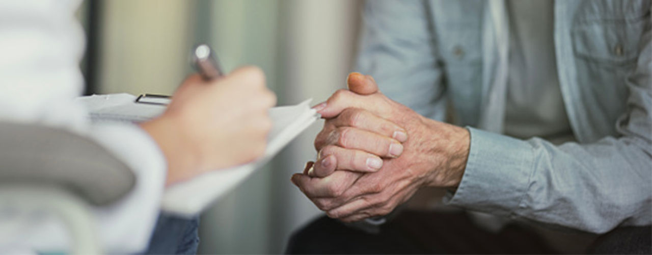 Person with two handing folding in an answering position